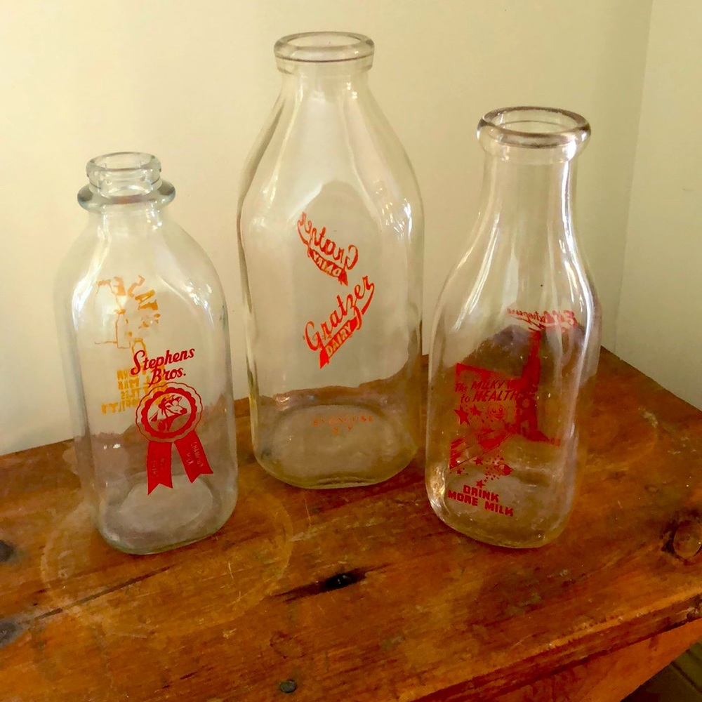 Glass milk bottles, assorted sizes